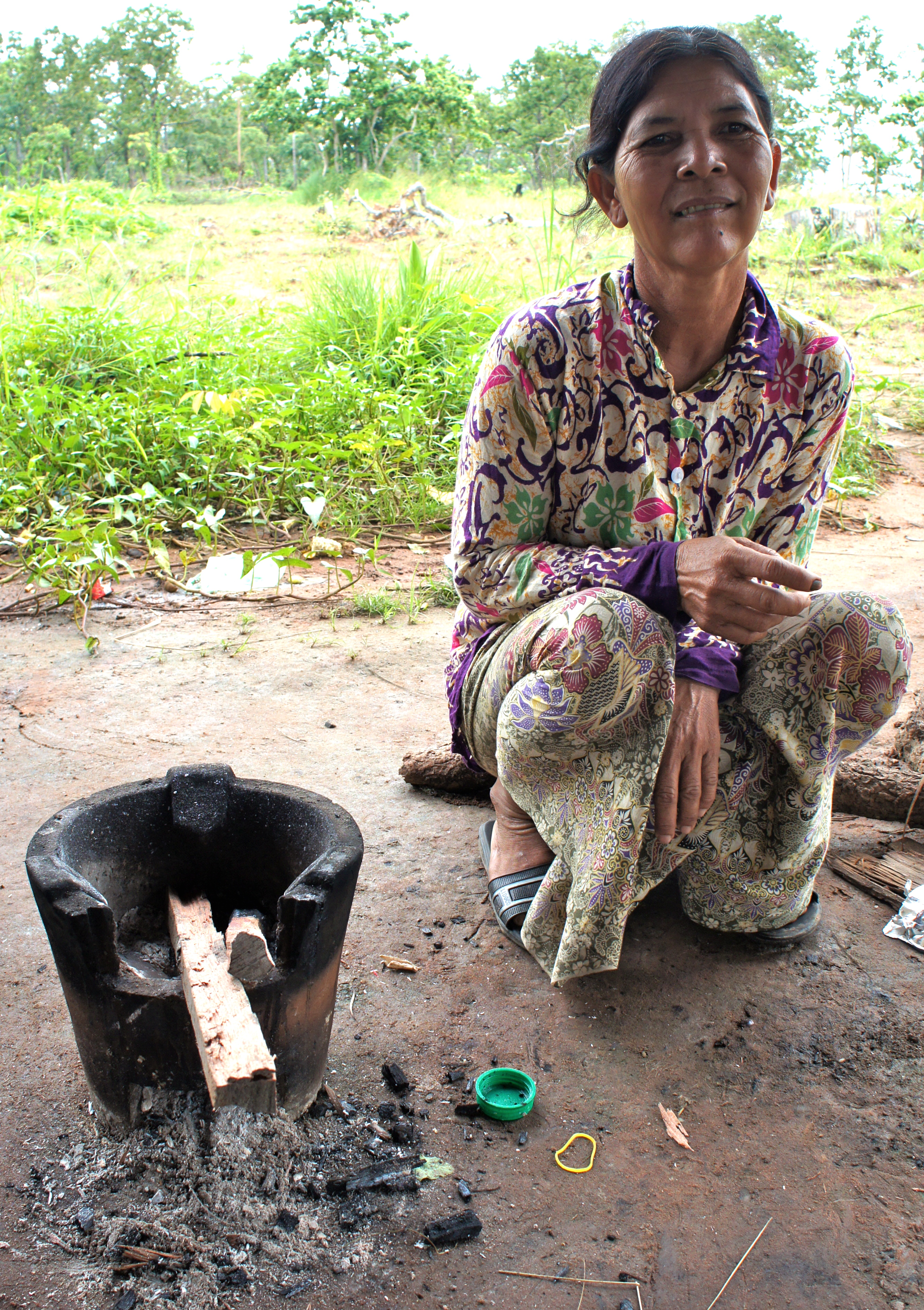 Cambodian lady with cookstove